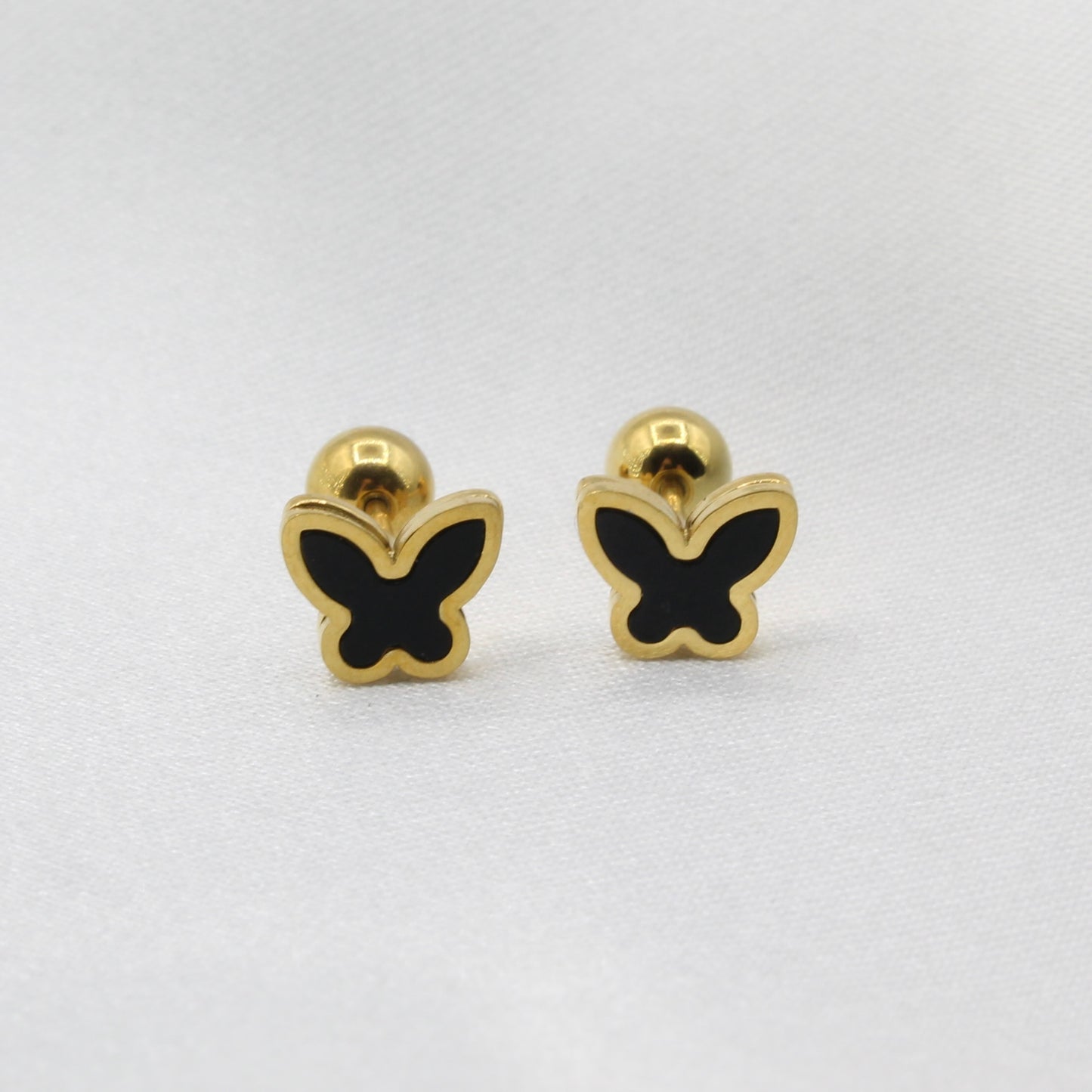 BLACK BUTTERFLY EAR PIERCING