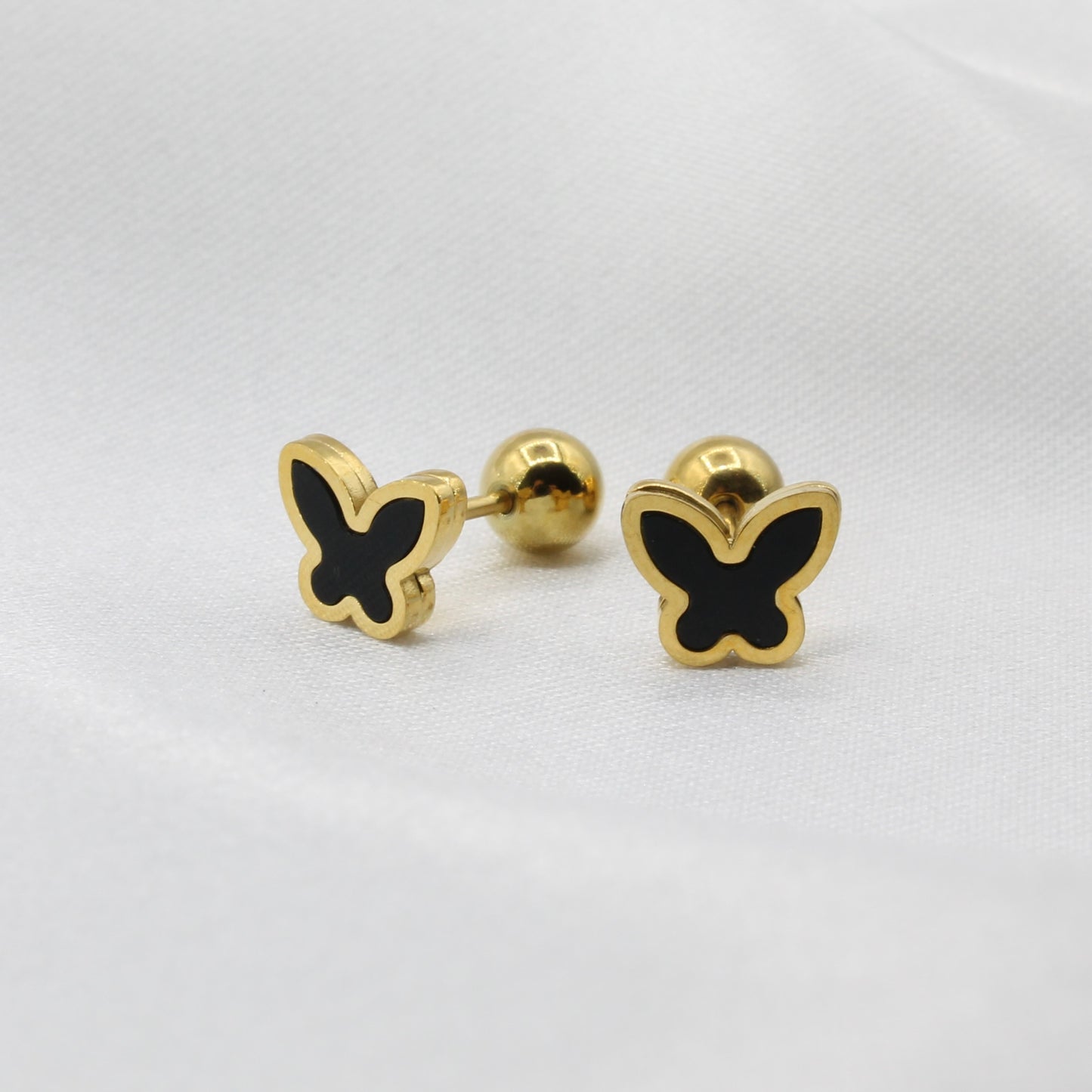 BLACK BUTTERFLY EAR PIERCING
